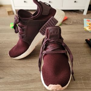 Maroon colored Adidas NMD’s